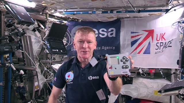Astronaut Tim Peake holding an Astro Pi in the ISS